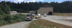 Several of Kenworth&apos;s vocational models head out for test drives on July 21 at DirtFish Rally School in Snoqualmie, WA. (Photo: Neil Abt/Fleet Owner)