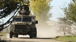 Staff Sgt Jonathan Spencer with the 791st Missile Security Forces Squadron rides in the turret of a BEARCAT during training at Minot Air Force Base in North Dakota US Air Force photo by Airman 1st Class Jessica Weissman