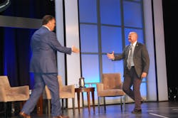 Erics Starks at right takes the stage Photo by Sean Kilcarr for Fleet Owner Erics Starks at right takes the stage Photo by Sean Kilcarr for Fleet Owner