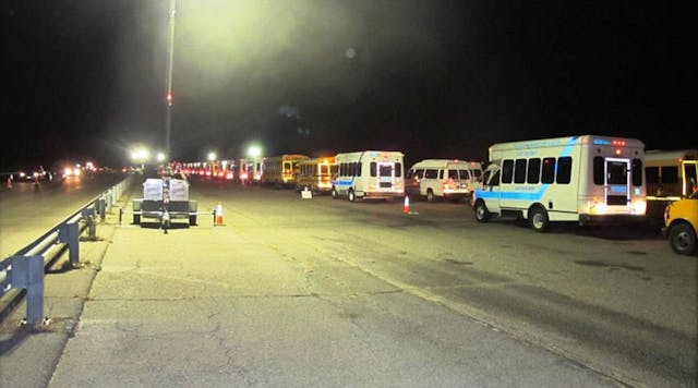 Nov. 6, 2012 - Ambulances and school bus line at night, Floyd Bennett Field (Photo courtesy NYC Dept. of Citywide Administrative Services)