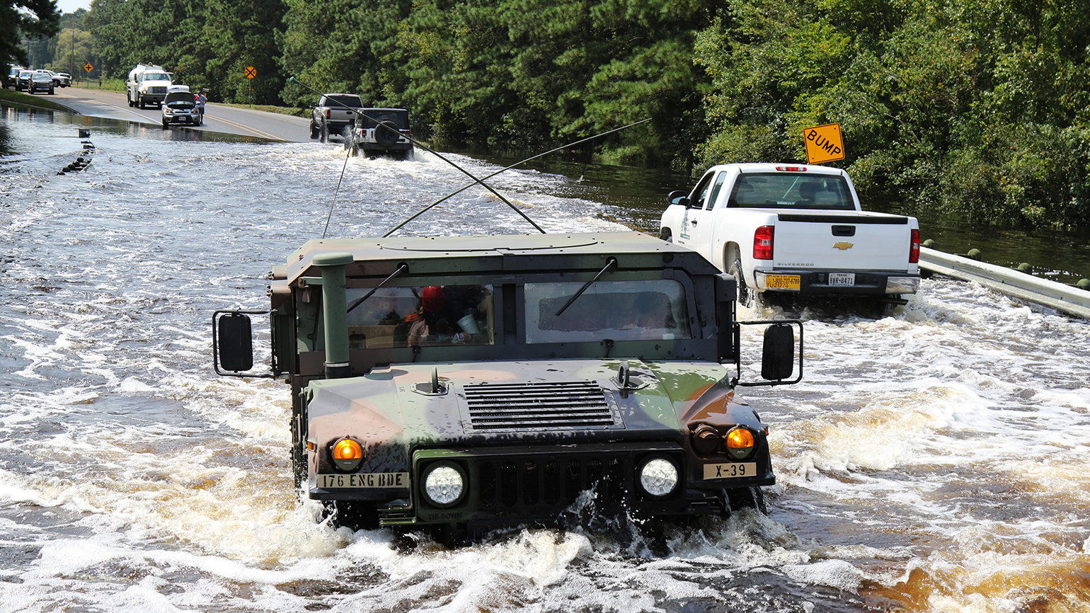 Flood conditions can continue well after the initial rain has fallen as water seeps off in rivers and streams and can overflow roadways Texas Army National Guard soldiers are shown here conducting reconnaissance missions in Port Arthur TX on Labor Day US Army photo by Staff Sgt Melisa Washington