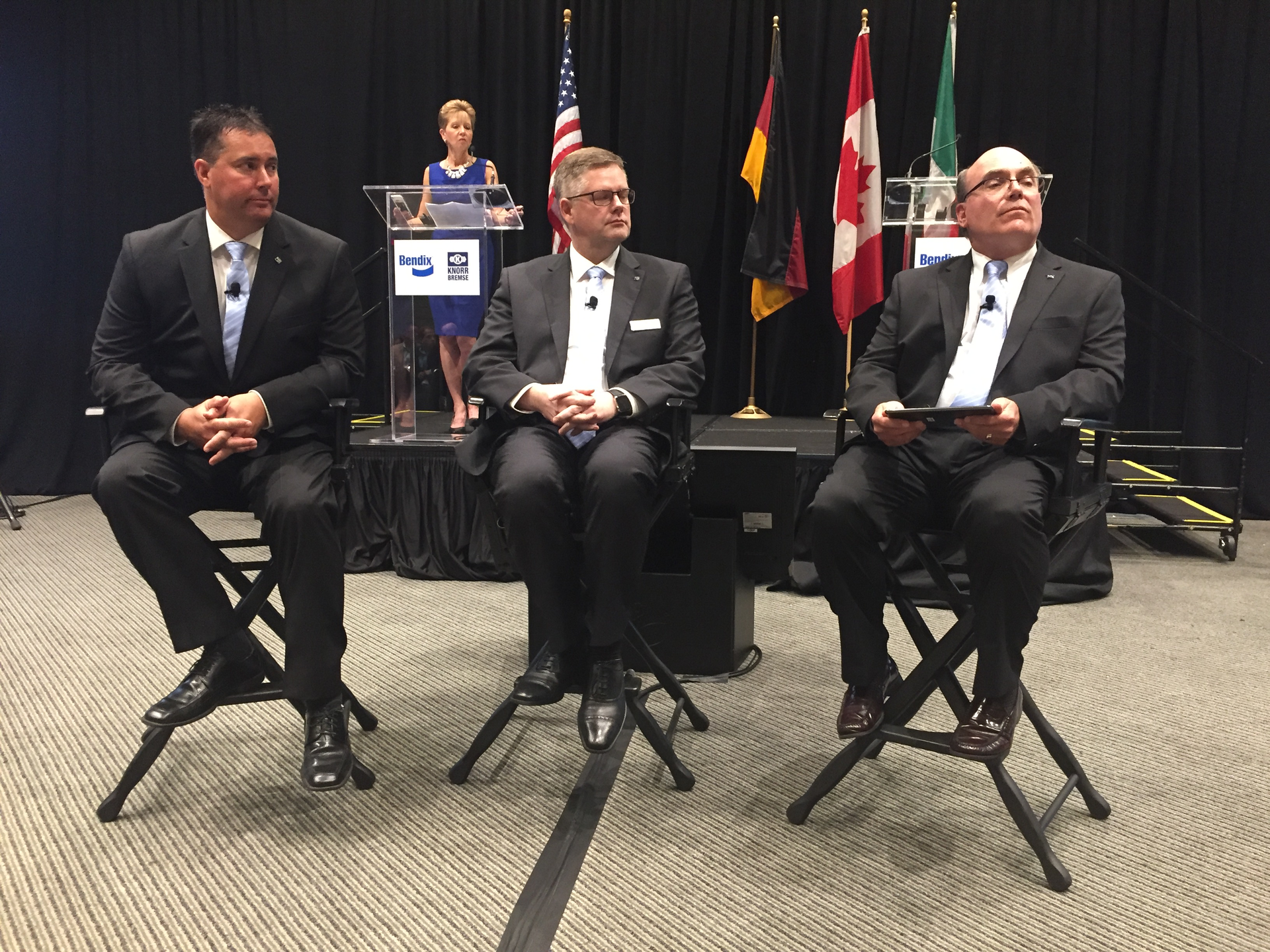 Front row left to right Keith McComsey director of marketing and customer solutions at Bendix Spicer Foundation Brake BSFB Berend Bracht Bendixrsquos president and CEO Fred Andersky director of customer solutions for the controls group at Bendix Background on stage Barbara Gould Bendix39s director of communications