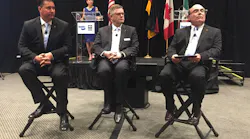 Front row left to right Keith McComsey director of marketing and customer solutions at Bendix Spicer Foundation Brake BSFB Berend Bracht Bendixrsquos president and CEO Fred Andersky director of customer solutions for the controls group at Bendix Background on stage Barbara Gould Bendix39s director of communications