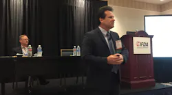 Don Durm standing discusses the new food safety rule impact on reefer trailers while Jim Hoss vice presidaent of transportation and operations for CashWa Distributing looks on Photo Sean KilcarrFleet Owner