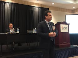 Don Durm standing discusses the new food safety rule impact on reefer trailers while Jim Hoss vice presidaent of transportation and operations for CashWa Distributing looks on Photo Sean KilcarrFleet Owner Don Durm standing discusses the new food safety rule impact on reefer trailers while Jim Hoss vice presidaent of transportation and operations for CashWa Distributing looks on Photo Sean KilcarrFleet Owner