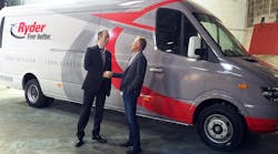 Chanje CEO Bryan Hansel, right, hands over the keys to one of Ryder&apos;s first 125 Chanje V8070 panel vans to Ryder&apos;s Chris Nordh.