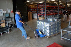 Parts pallet being moved Parts pallet being moved