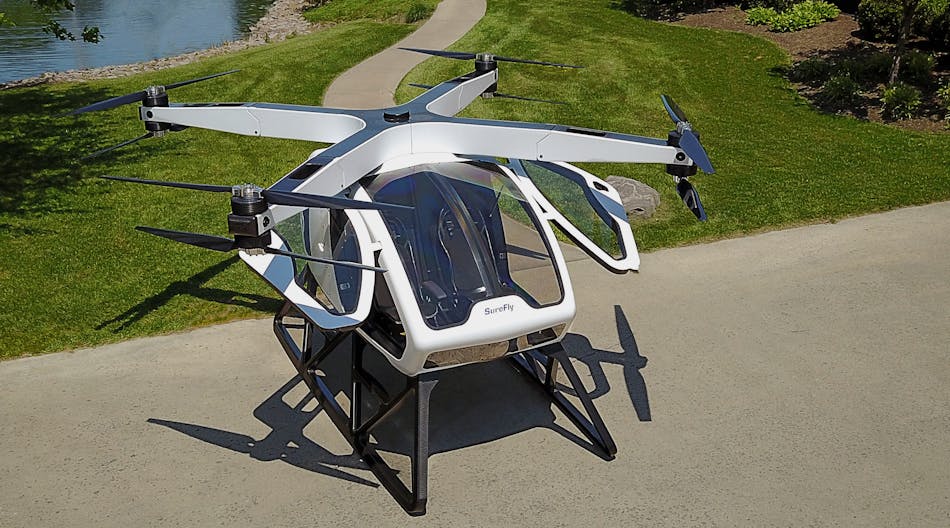 The SureFly personal helicopter could fit two people and travel up to 70 miles before needing to refuel.