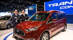 Striking a &ldquo;classic&rdquo; Blues Brothers pose, Mark LaNeve, Ford&rsquo;s vice president for U.S. marketing, sales and service (left) and actor Jim Belushi introduce the 2019 Ford Transit Connect Wagon at the Chicago Auto Show.