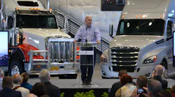 DTNA president and CEO Roger Nielsen speaks at the opening of the company's test track in Madras OR.