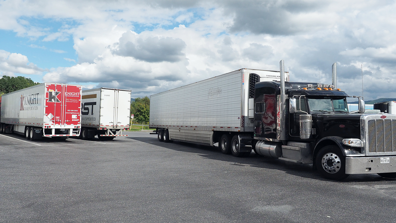 Semi-trucks and trailers at truck stop