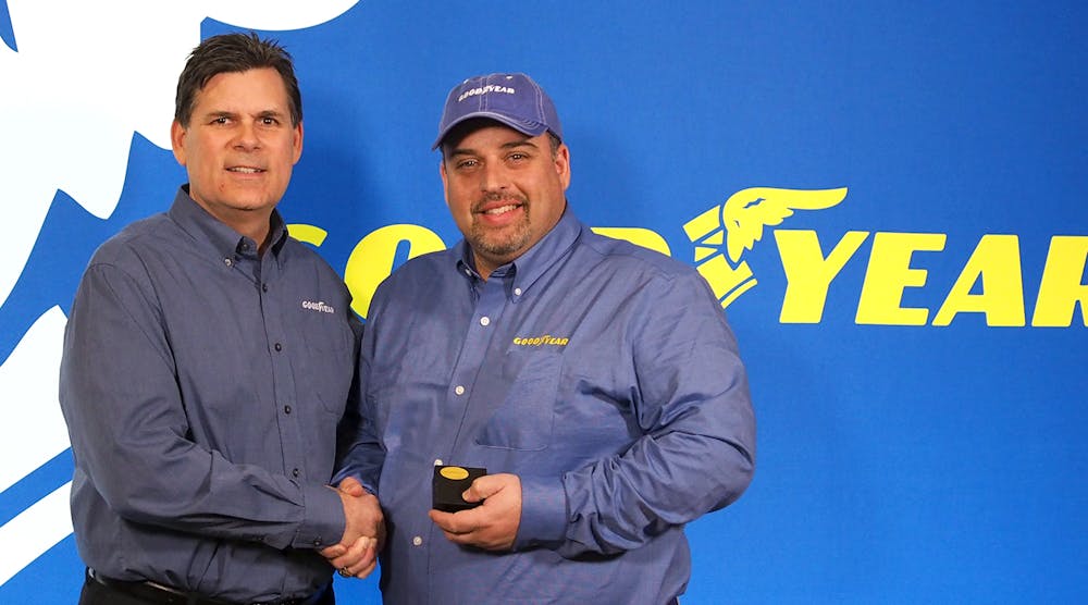 Gary Medalis, left, marketing director at Goodyear, and truck driver Frank Vieira, who was named Goodyear&apos;s Highway Hero this year, marking the 35th anniversary of the event.