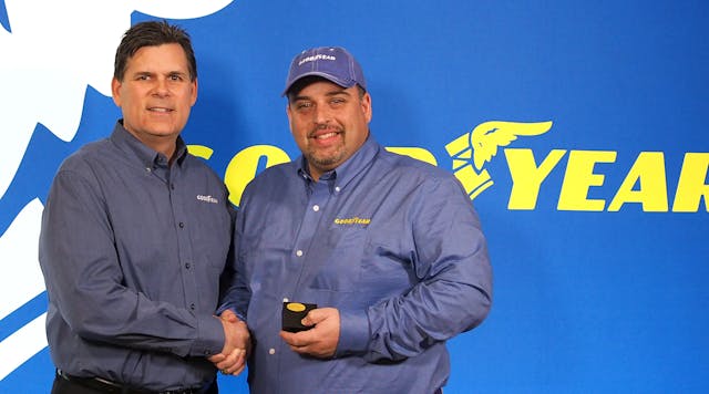 Gary Medalis, left, marketing director at Goodyear, and truck driver Frank Vieira, who was named Goodyear&apos;s Highway Hero this year, marking the 35th anniversary of the event.