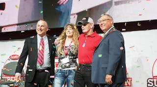 Rick McClerkin, second from right, was named Peterbilt&apos;s ultimate SuperFan at the 2018 Mid-America Trucking Show. He&apos;s shown here with fianc&eacute;e Kathy Cantaloube to his right and Peterbilt General Manager Kyle Quinn, far left, and Robert Woodall, assistant general manager of sales and marketing at Peterbilt.