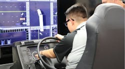 A student at Patterson High School uses a truck simulator.