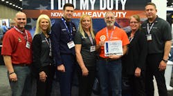 Left to right, Paul Thompson, military recruiting manager at U.S. Express; Valerie Nadalini, senior director of brand engagement at Lund International; Blair Petterson, recruiter for the Coast Guard; Mary Berman, wife of honoree; Larry Berman, honoree; Kelli Brooks, director of customer development at Lund; and Ralph Banks, vice president of sales, heavy trucking, at Lund International.