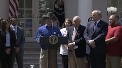 Marvin Fielder, a military veteran who now drives for Werner Enterprises, speaks at the White House.