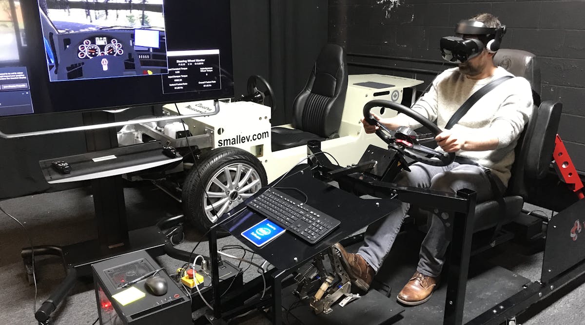Abt takes a virtual spin in a Kenworth truck at VRMotion&apos;s office in Oregon.