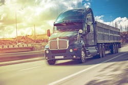 Rural landscape with an asphalt highway and truck Rural landscape with an asphalt highway and truck