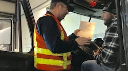 Abe Dunivin with Oregon DOT talks with a trucker who did not have a working ELD during a January inspection.