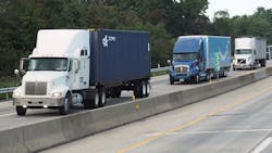 042518-Rigs_on_highway-AGM.jpg 042518-Rigs_on_highway-AGM.jpg