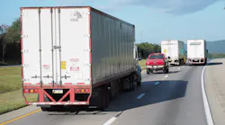 Trucks mixing with passenger cars on highway