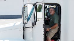 Truck driver entering heavy truck Truck driver entering heavy truck
