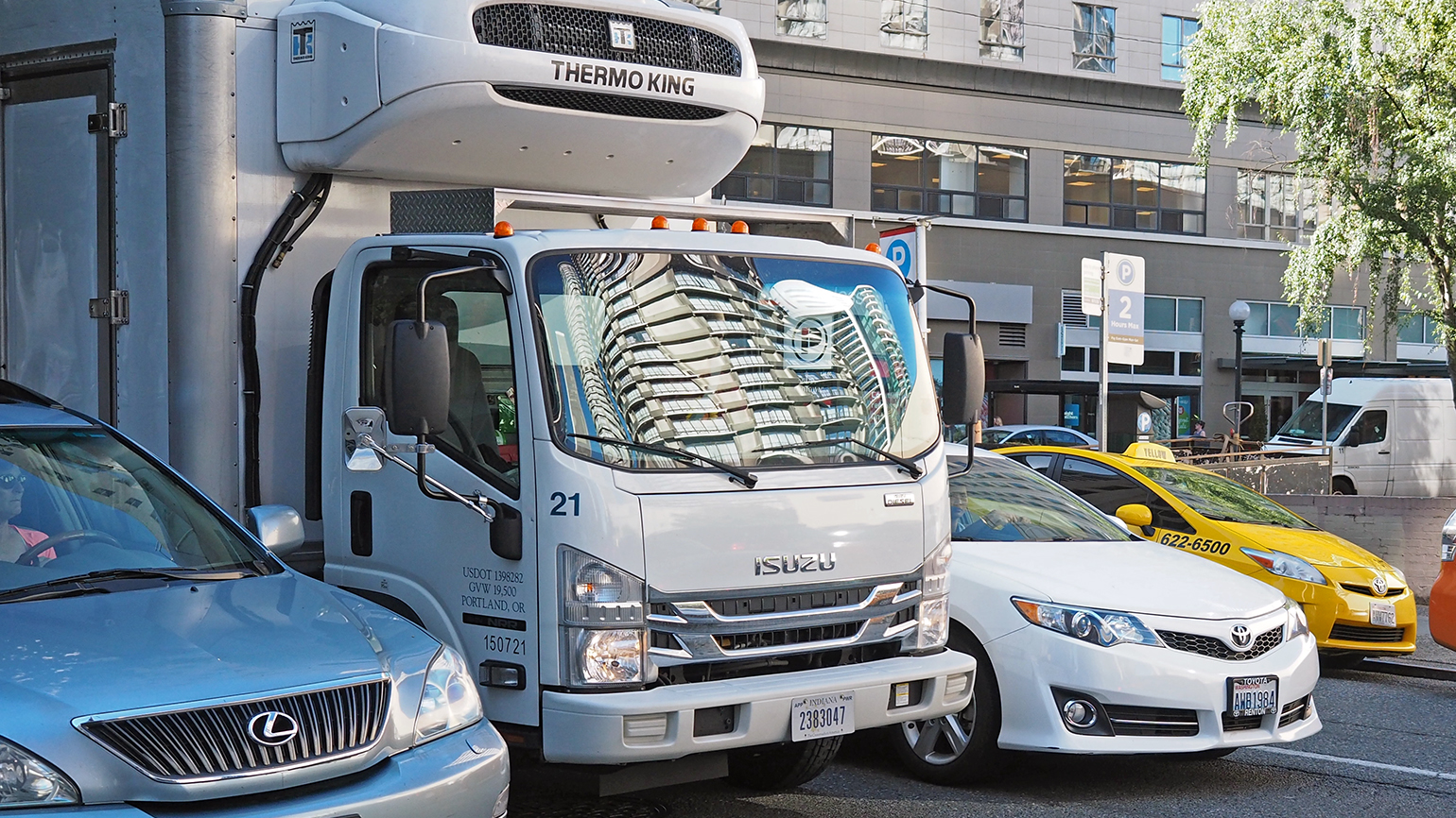 Delivery truck in tight urban setting