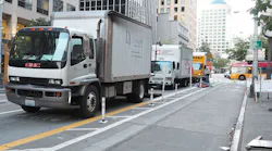 Trucks compete for curb space