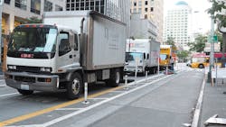 Trucks compete for curb space Trucks compete for curb space