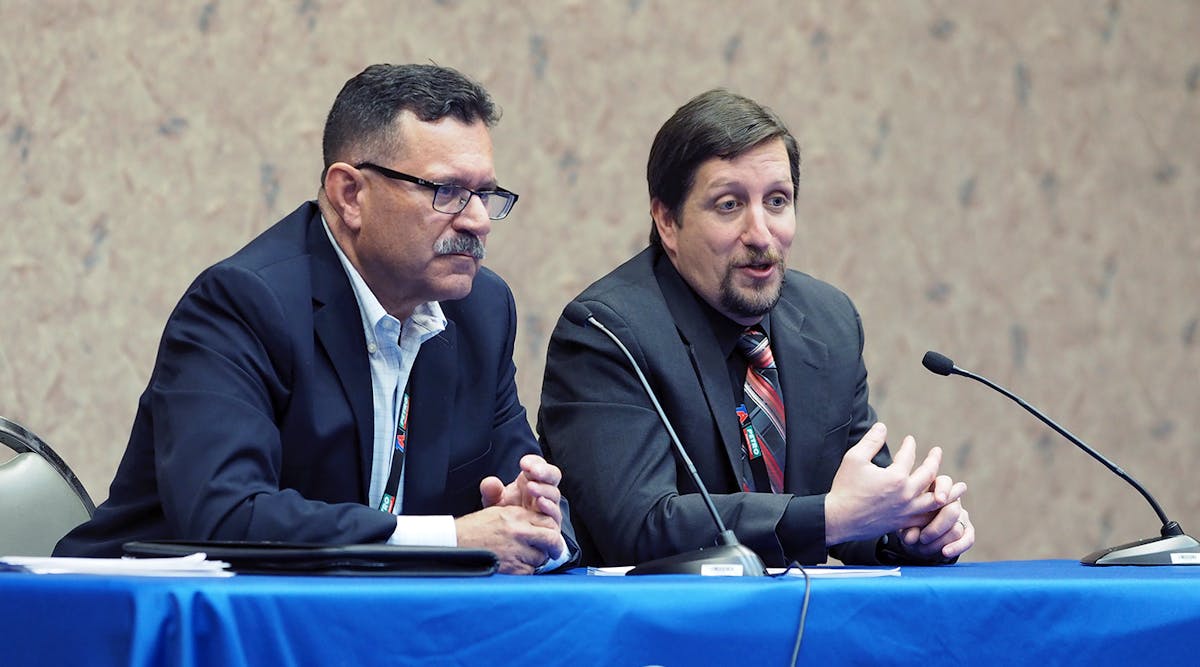 FMCSA Administrator Ray Martinez, left, and Joe DeLorenzo, director of the agency&apos;s Office of Compliance and Enforcement, listen to truck drivers about difficulties with the Hours of Service regulations.