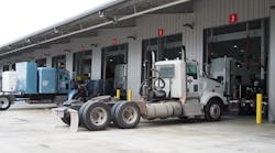 trucks at maintenance bay trucks at maintenance bay