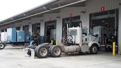 trucks at maintenance bay trucks at maintenance bay