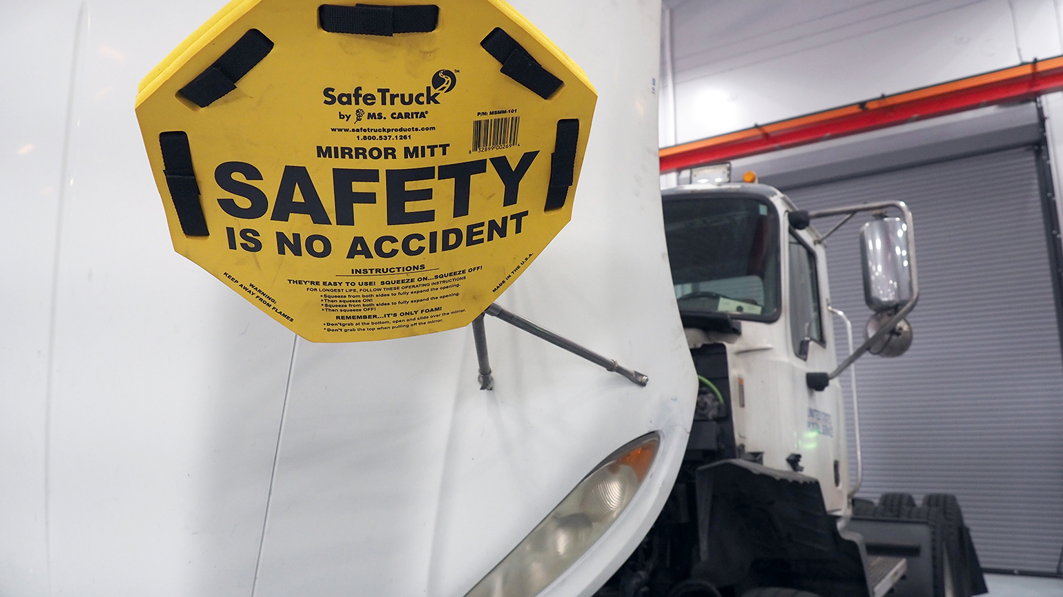'Safety is no accident' truck mirror protector