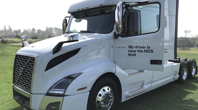 A Volvo tractor at the Verizon Connect conference highlights the ability to alert fleets to available hours of service.