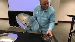 Jonathan Fleck demonstrates Deflektor&apos;s Hardspot wheel cover.