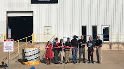 The Longview Chamber of Commerce Reach Team joins BestDrive employees to celebrate the ribbon cutting. Store operations manager Frankie Hendrix cuts the ribbon.