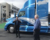 Andrew Lund of Toyota (left) with Kenworth&apos;s Brian Lindgren at CES.