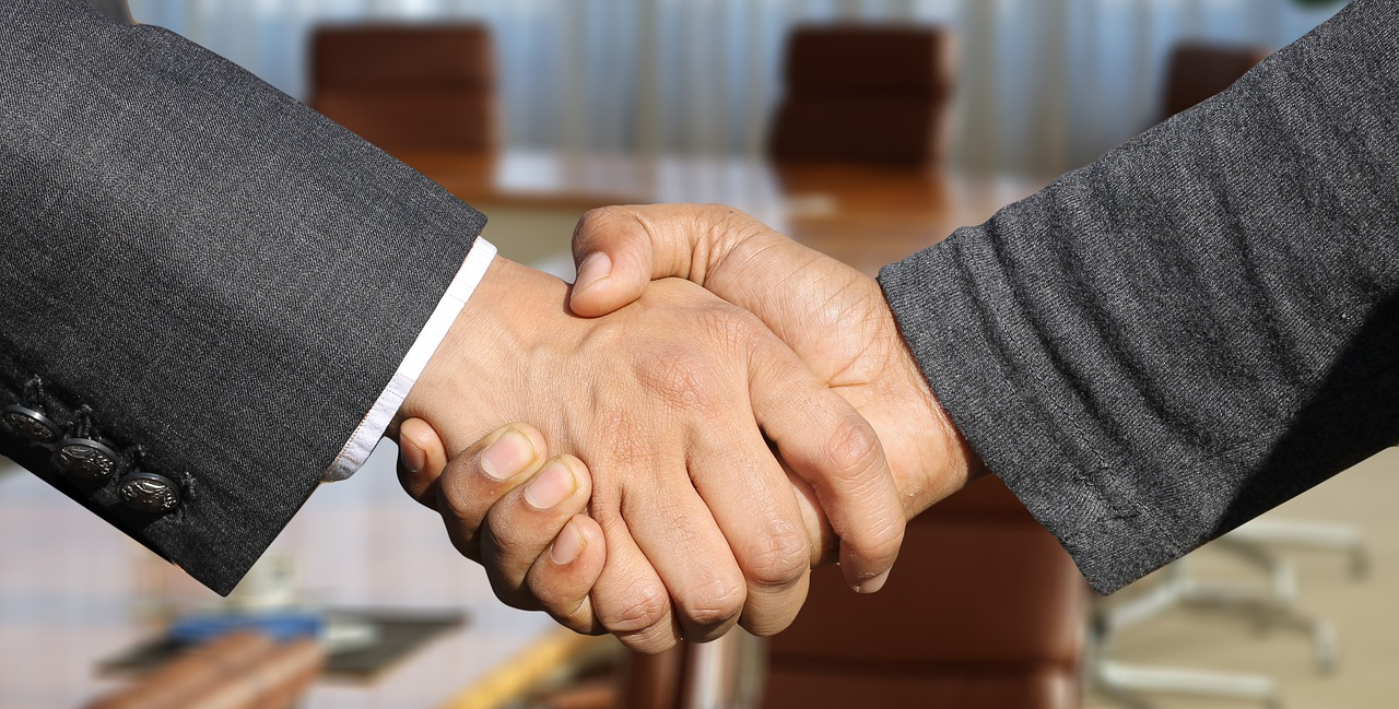 1.11.19 shaking hands stock image.jpg