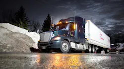 black truck at night reflection