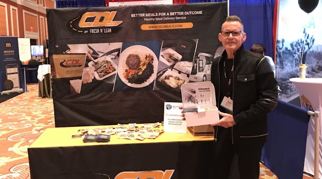 Bob Perry shows a typical meal offered by the new CDLMeals delivery service.