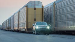 An all-electric Ford F-150 prototype during a capability test. The battery-powered truck successfully towed more than 1.25 million pounds of rail cars and trucks during the test.