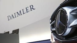 The Daimler and Mercedes logos The Daimler and Mercedes logos