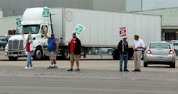 UAW members working at General Motors&apos; powertrain plant in Flint, Michigan, picket outside, striking for better benefits since Sep. 16, 2019. A deal is pending ratification.