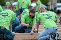 Bendix employees assist in a Habitat for Humanity project.