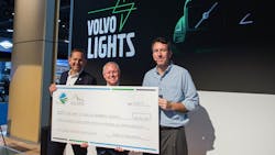 VTNA President Peter Voorhoeve (left) poses with a funding check for Volvo LIGHTS at ACT Expo in May 2019. VTNA President Peter Voorhoeve (left) poses with a funding check for Volvo LIGHTS at ACT Expo in May 2019.