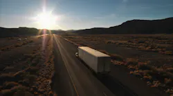 Truck On Highway In Sun