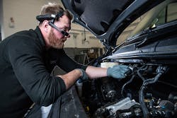 A technician at a Volkswagen repair facility will put on a the HMT-1 wearable computer to stream real-time video to an expert offsite. A technician at a Volkswagen repair facility will put on a the HMT-1 wearable computer to stream real-time video to an expert offsite.