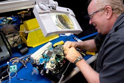 A Ventec Life Systems worker operates on a VOCSN machine, which combines the work of five respiratory medical devices into one. A Ventec Life Systems worker operates on a VOCSN machine, which combines the work of five respiratory medical devices into one.