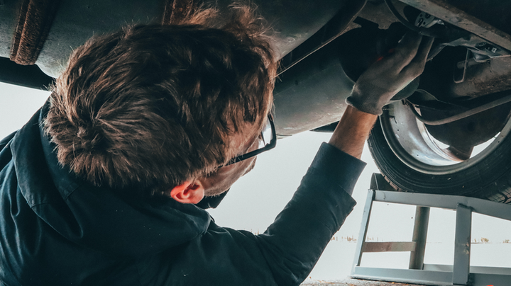 040720 Man Fixing Vehicle Engine 5e8c871210135